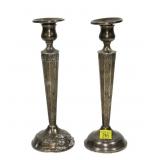 Pair of 8.25" sterling weighted candle sticks,
