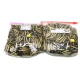 Lot, 2 bags brass: 1bag  5.56 once fired brass,