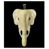 Vintage carved elephant head pendant with sterling