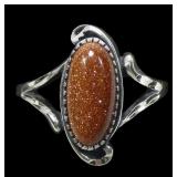 Sterling silver split shank dentil set goldstone