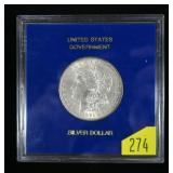 1921 Morgan dollar in U.S. Government holder, gem