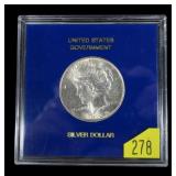 1922 Peace dollar in U.S. Government holder, BU
