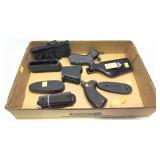 Lot: assorted gun grips, butt stock pads and
