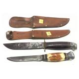 Lot, 2 vintage hunting knives with leather sheaths