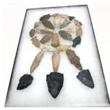 Collection of Native American stone arrow heads,