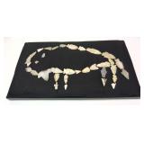 Collection of Native American stone arrow heads,