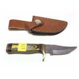 Custom Damascus blade knife with embossed