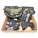 Lot: Camo canvas waist bag and assorted holsters