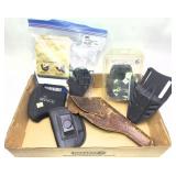 Lot: Assorted holsters and rife stock sleeve