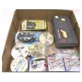 Lot: Assorted fishing items includes line, hooks