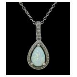 Sterling silver prong set pear chape opal pendant
