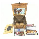 Wooden crate with gun cleaning supplies,