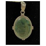 Sterling silver bezel set green stone pendant,