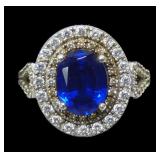 Sterling silver oval cut blue simulant with round