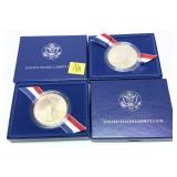 x2- 1986 Liberty commemorative silver dollars,