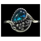 Sterling silver dentil set blue paua ring with