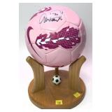 Signed Abby Wambach Nike Soccer Ball on wooden