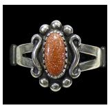Sterling silver dentil set split shank goldstone