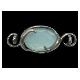 Sterling silver oval cut pale green stirrup design