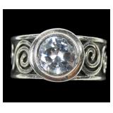 Sterling silver scrolled bezel set round brilliant
