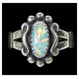 Sterling silver dentil set fire opal ring in split