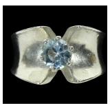 Sterling silver round cut light blue topaz ring in