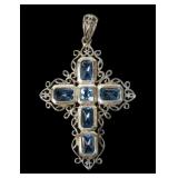 Vintage sterling silver bezel set blue topaz cross
