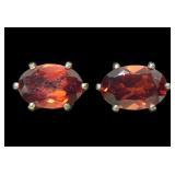 Sterling silver oval cut garnet stud earrings