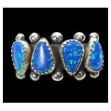 Sterling silver pear shape lab blue opal 4-stone
