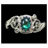 Sterling silver dentil set blue paua ring with