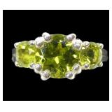 Sterling silver round cut 3-stone peridot ring