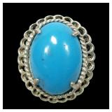 Sterling silver prong set turquoise ring with