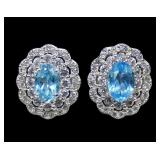 Sterling silver oval cut blue topaz post earrings