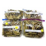 Lot, 4 bags of brass: .35 REM bag marked 103 pcs.,