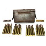 Leather cartridge case with German 8mm brass