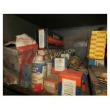 2 SHELVES VARIOUS NOS CAR PARTS,DECO ADV. ETC