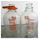 (2) 1G. ROWN COUNTY MILK JUGS