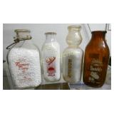 (4) QT FARMERS, PEELERS 1G. AMBER BOTTLES