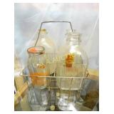 CARRIER W/ (4) BOTTLES ALL JERSEY,BILTMORE,DIST.