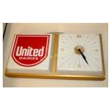 UNITED DAIRIES LIGHTUP CLOCK 26X12
