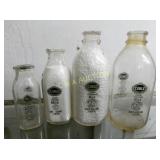 (4) PINT-1/2G. GREEN COBLE MILK BOTTLES
