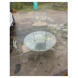 GLASS TABLE W/ 4 IRON CHAIRS 41X30