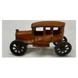 Early Cast Iron Toy Car with Orange Paint and Spok