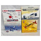 4 Die-Cast Vintage Airplane Coin Banks in Original