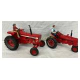 Two 1/16 Scale Red Farm Tractors with Driver Figur