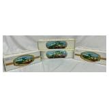 4 Unopened Hess Toy Trucks in Original Boxes