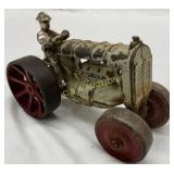 Cast Iron Toy Tractor with Driver and Red Spoked W