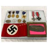 12 WWII German Medals, Badges, and Textile Items 12 WWII German Medals, Badges, and Textile Items