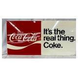 Metal Coca-Cola Sign Featuring "It