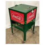 Green and Red Metal Coca-Cola Drink Cooler on Cast